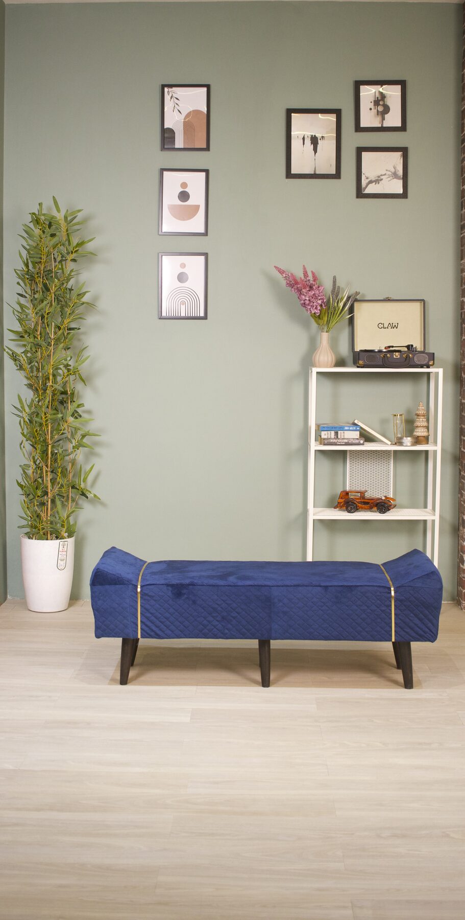 The Dual Wall — sage green wall meeting exposed brick