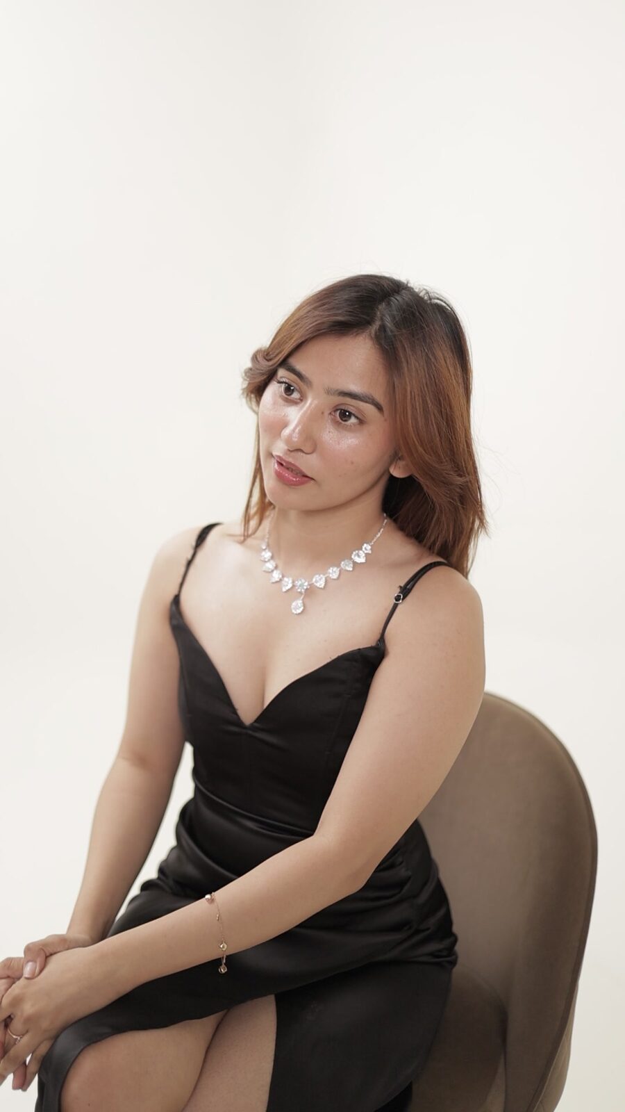 A portrait shot against the seamless wall
