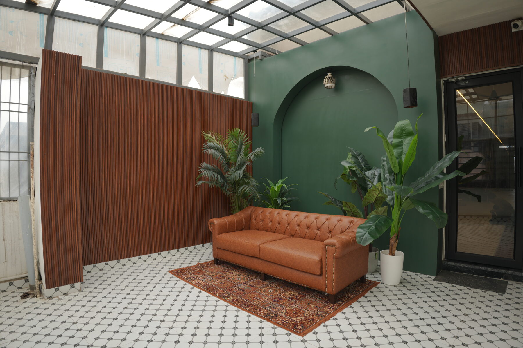 The Palm set under the studio skylight