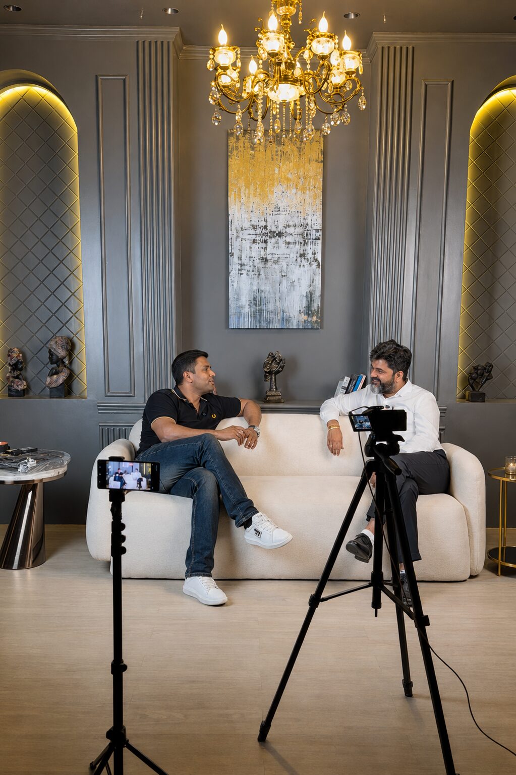 Two-guest interview setup on the lounge sofa